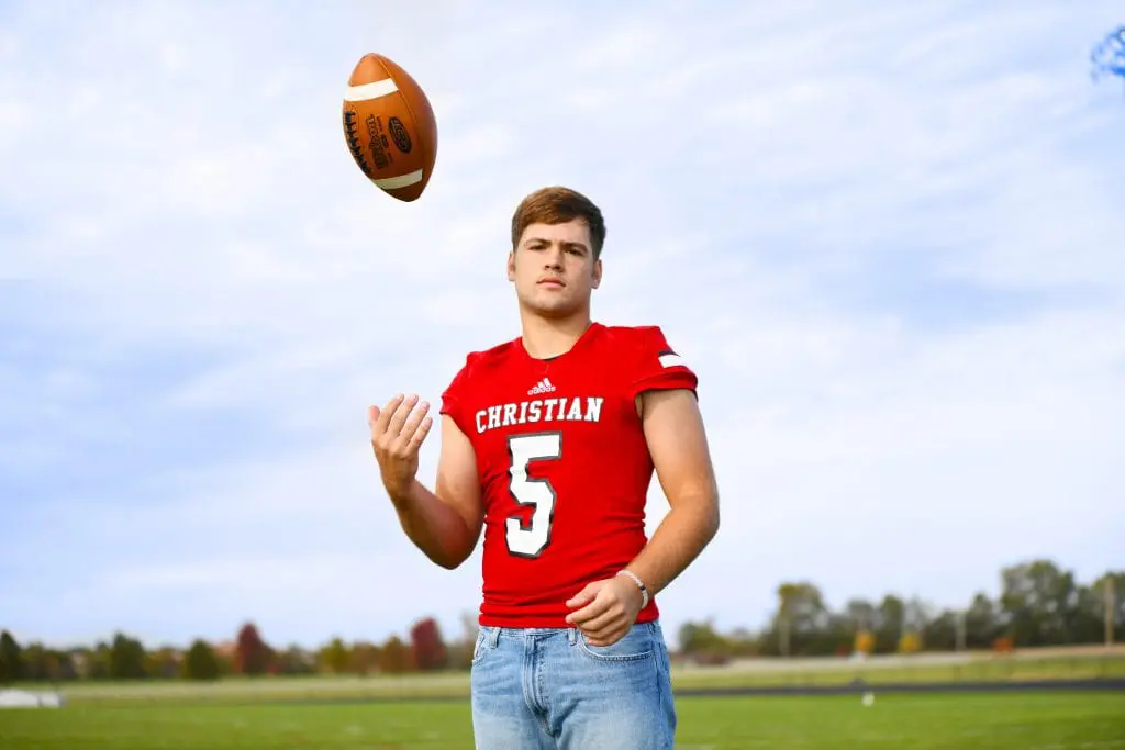 High school football player serious face individual photo